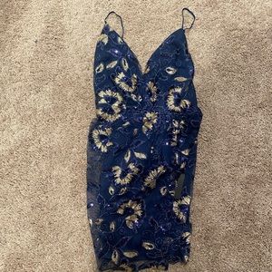 Lulu’s blue and gold mini dress. Never worn. Tags still attached.